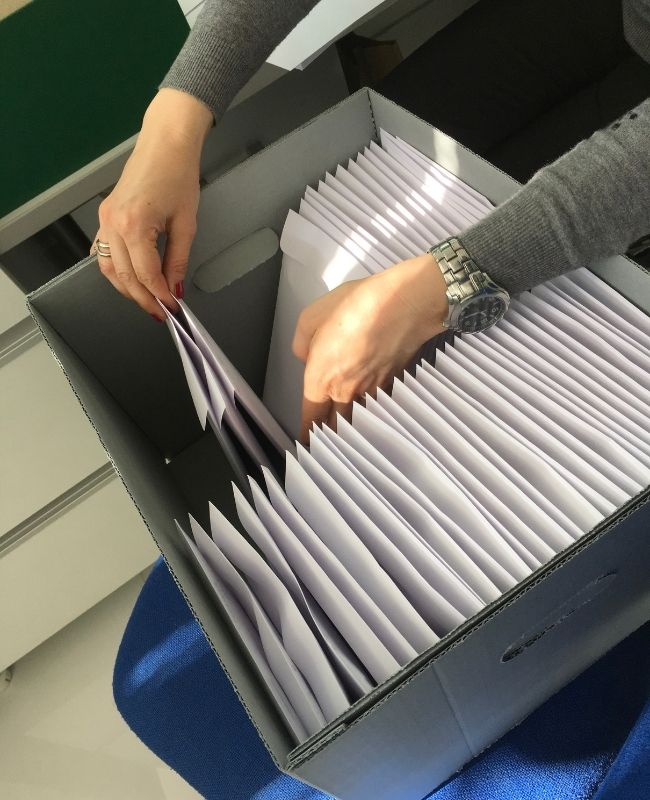 Woman archiving documents